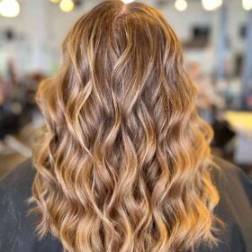 Honey blonde wavy hair